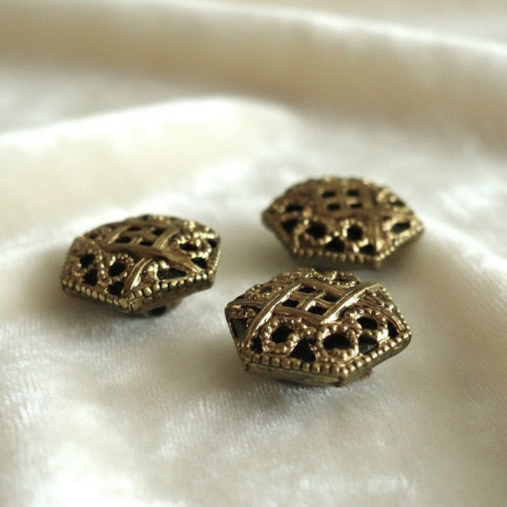 15L Set of Three 1890-1910 Art Nouveau Pierced Brass Dimi Buttons, 3/8", showing side view.