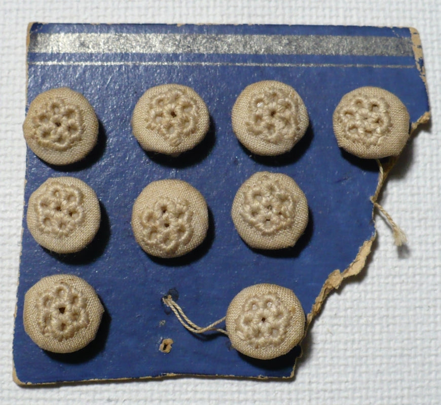 12L 1920s-1930s Embroidered Fabric Buttons 5/16 Inches Set of 9 om white ground.