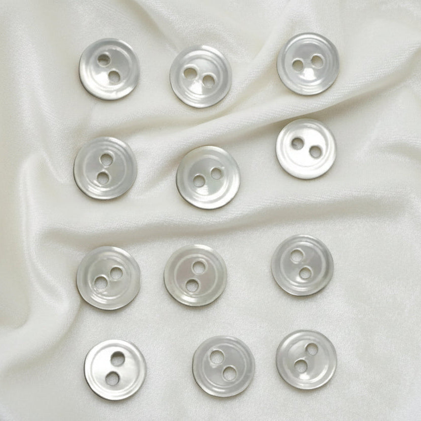 7L Set of Twelve TwohHole Flat Pearl Shell Diminutive Buttons, 3/16".