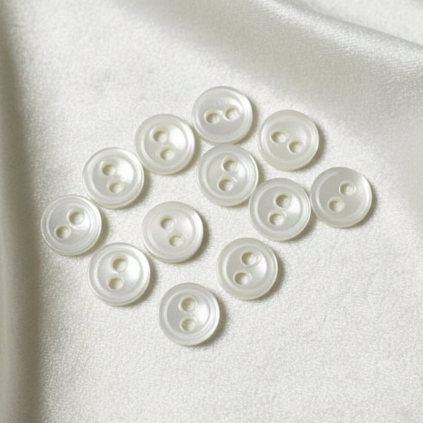 7L Set of Twelve Two-Hole Flat Pearl Shell Diminutive Buttons, 3/16".