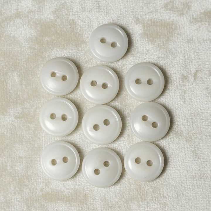20L Set of Ten Two Hole White Celluloid Buttons, 1/2".