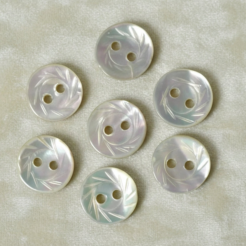 13L Set of Seven Two-Hole Fancy Conch Shell Dimi Buttons, 1/4".