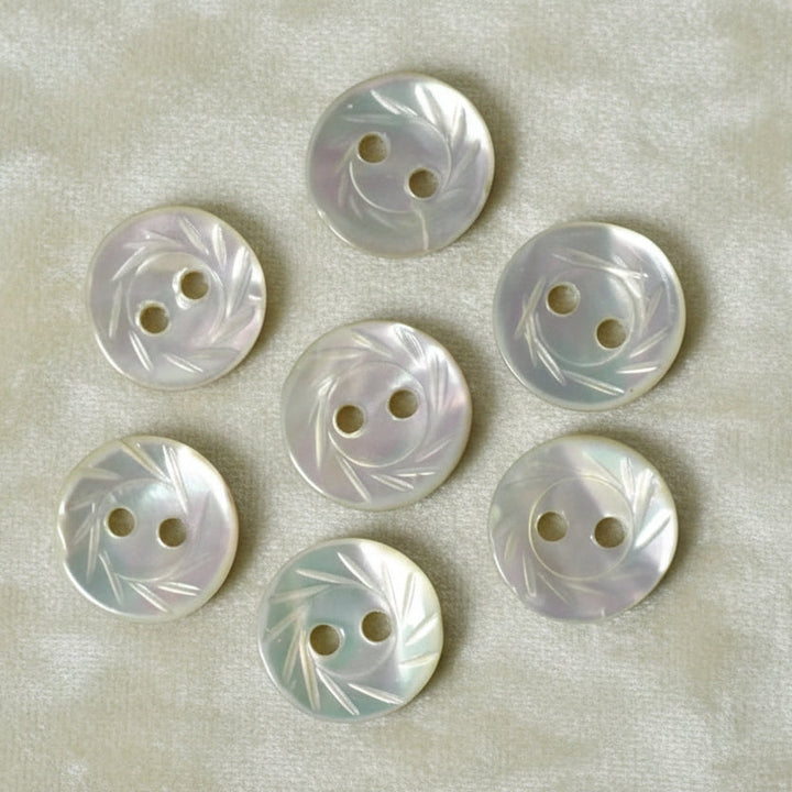 13L Set of Seven Two-Hole Fancy Conch Shell Dimi Buttons, 1/4".