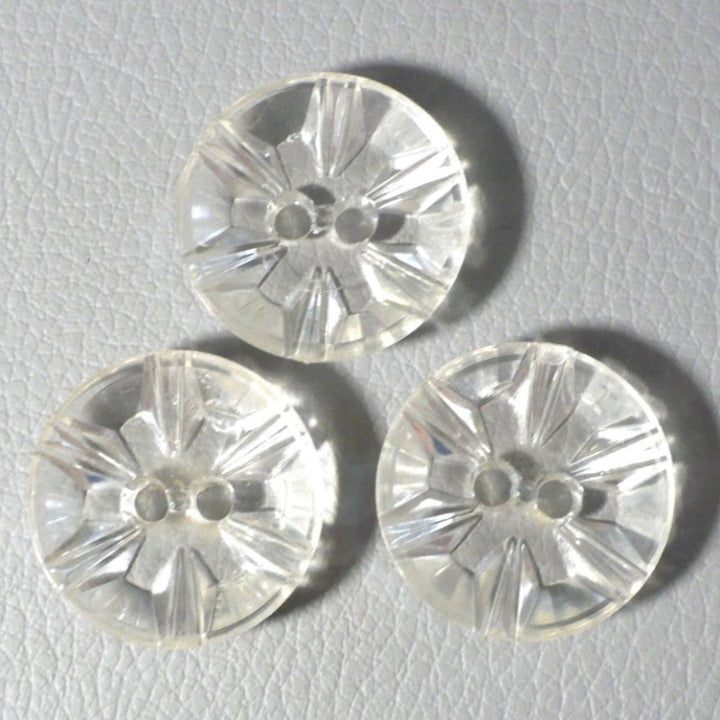 Back faces of 30L Set of Three 1950s Clear as Crystal Lucite Two-Hole Buttons, 3/4", on gray background.