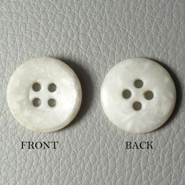 22L Set of 23 Four-Hole Speckled Casein White Buttons.