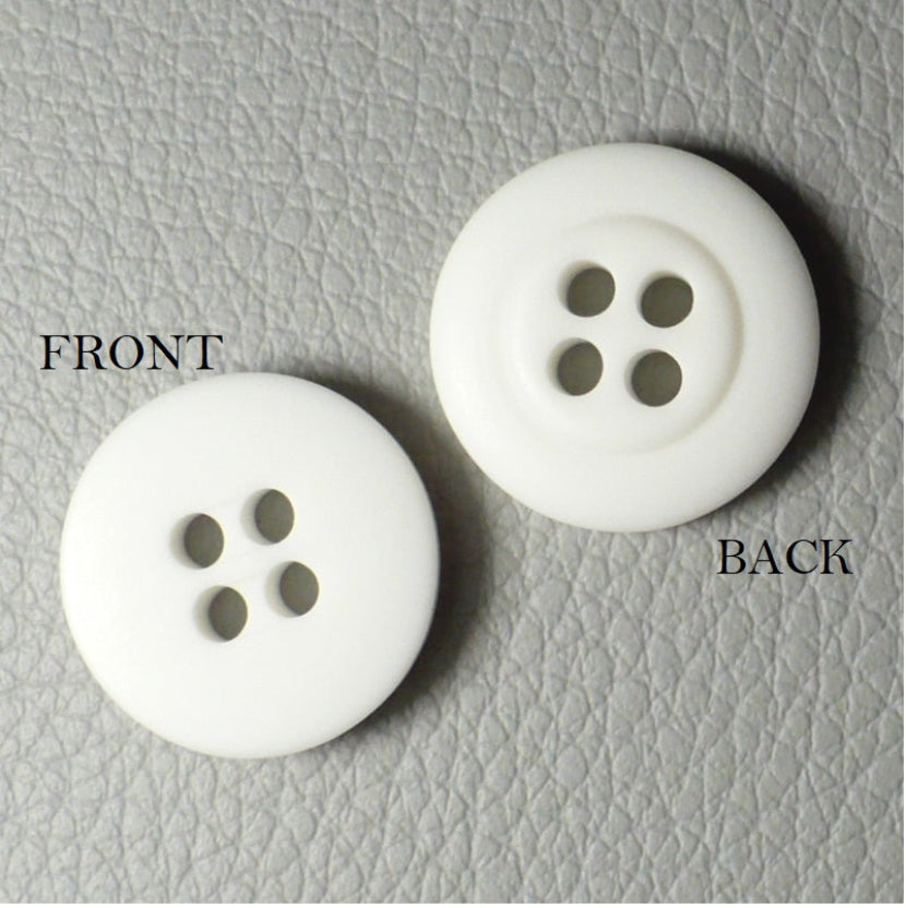 23L Set of Six White Four Hole Casein Buttons.