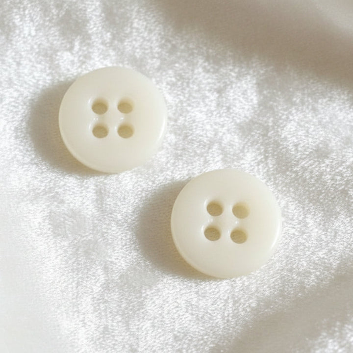 27L Set of Two Matte White Four-Hole Casein Trouser Buttons.