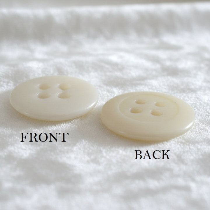 27L Set of Two Matte White Four-Hole Casein Trouser Buttons.