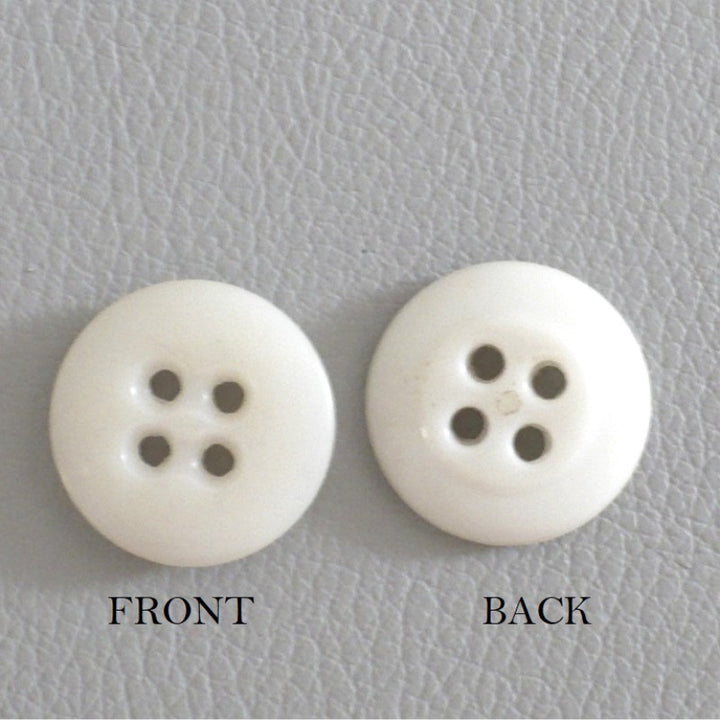 27L Set of 13, 1940s Matte Off-White Four-Hole Casein Buttons.
