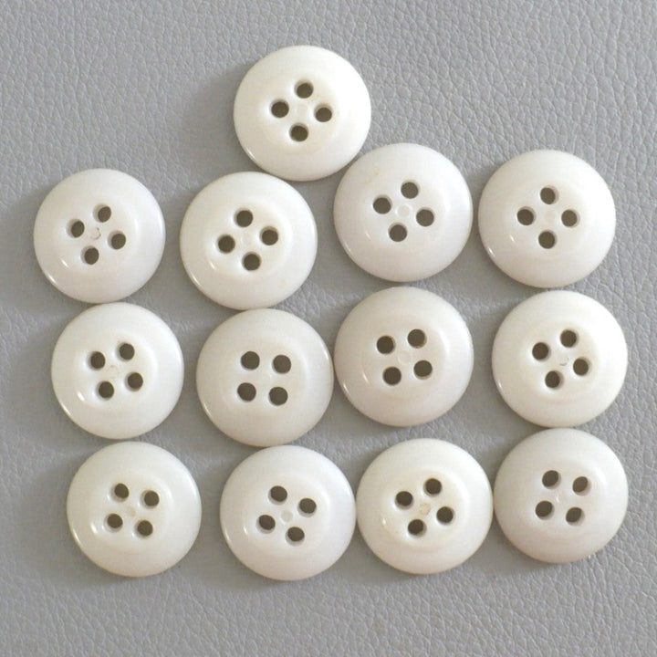 27L Set of 13, 1940s Matte Off-White Four-Hole Casein Buttons, 5/8"