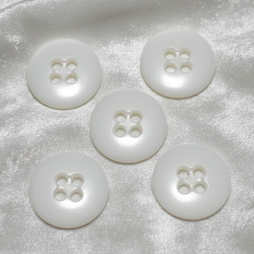 27L Set of Five Opaque White Four-Hole Casein Trouser Buttons.