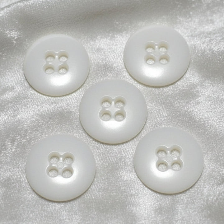 27L Set of Five Opaque White Four-Hole Casein Trouser Buttons.