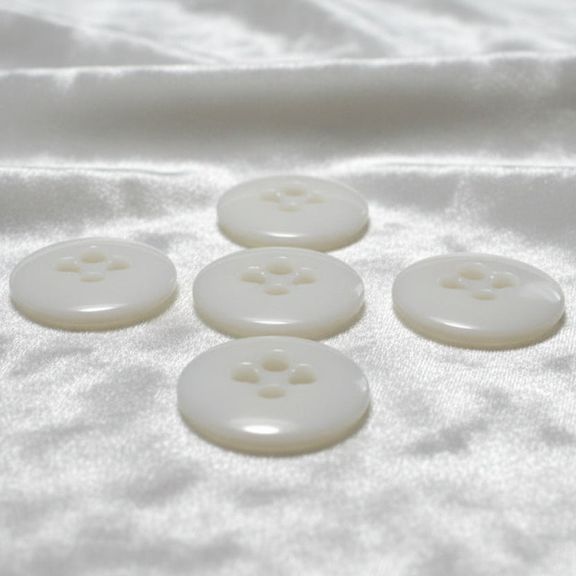 27L Set of Five Opaque White Four-Hole Casein Trouser Buttons.