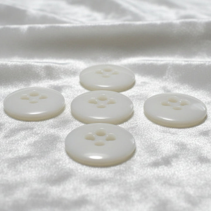 27L Set of Five Opaque White Four-Hole Casein Trouser Buttons.