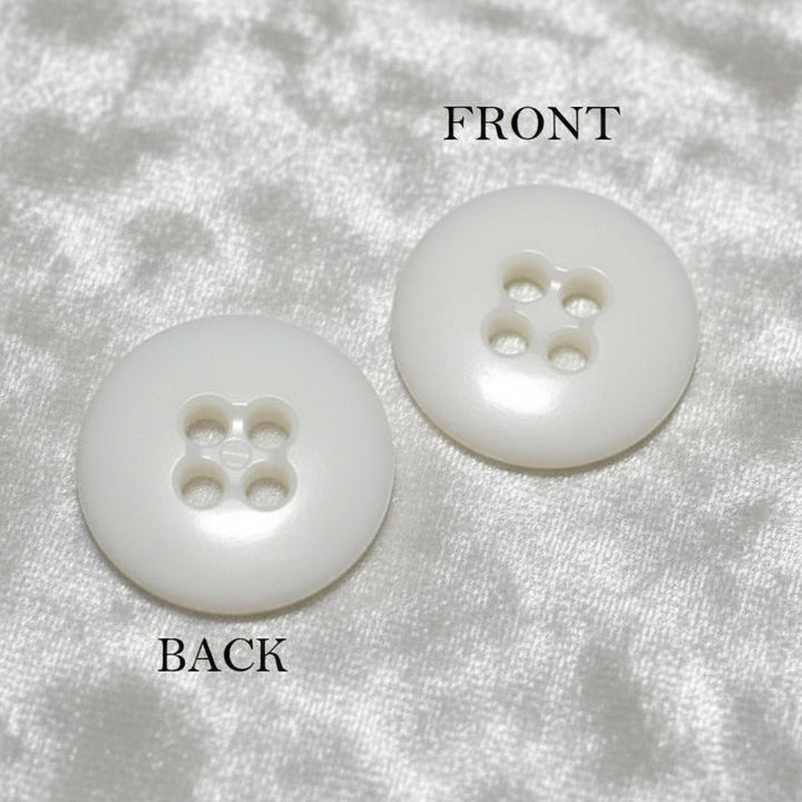 27L Set of Five Opaque White Four-Hole Casein Trouser Buttons.