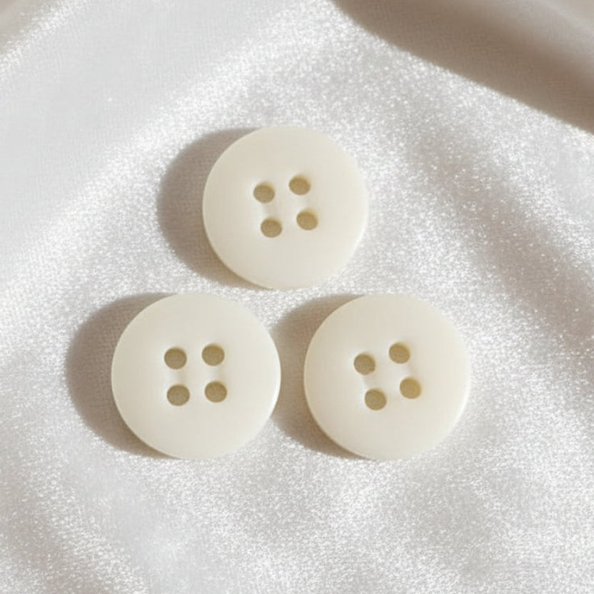 27L Set of Three Matte Off-White Four Hole Casein Trouser Buttons, 3/4"