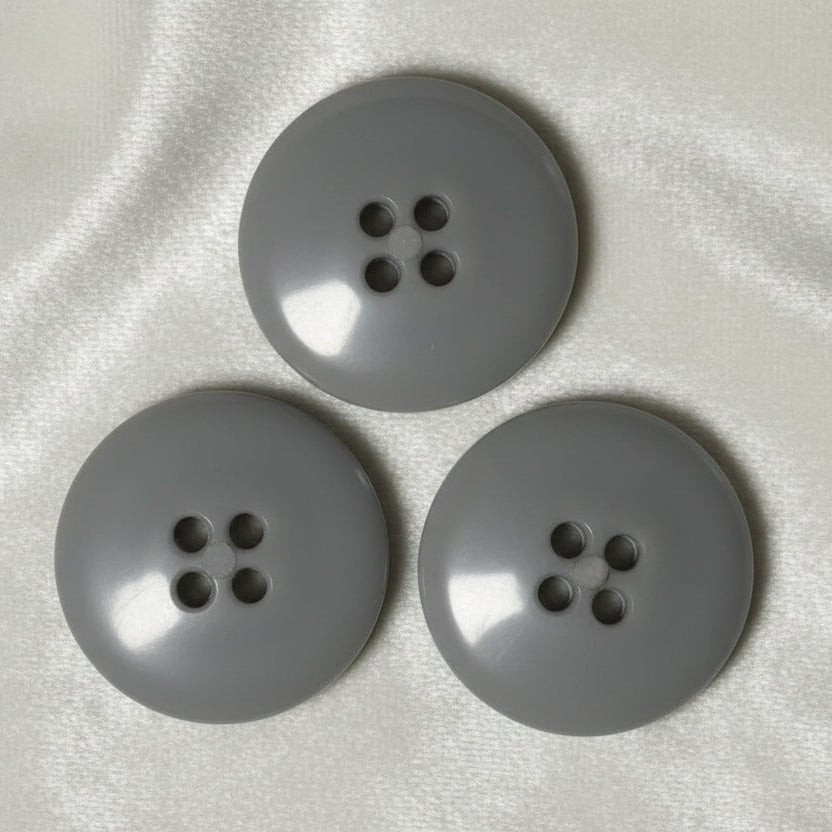 30L Set of Three Grey Four Hole Plastic Buttons, 3/4".