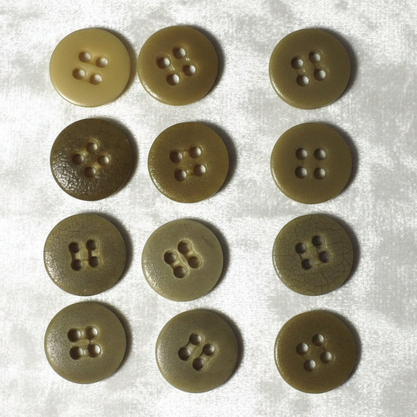 27L Set of Eight 1900s Four Hole Casein Trouser Buttons, 3/4".
