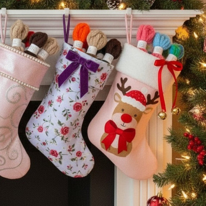 1970s vintage fluffy yarn hair ribbons shown as stocking stuffers in Christmas stockings. 