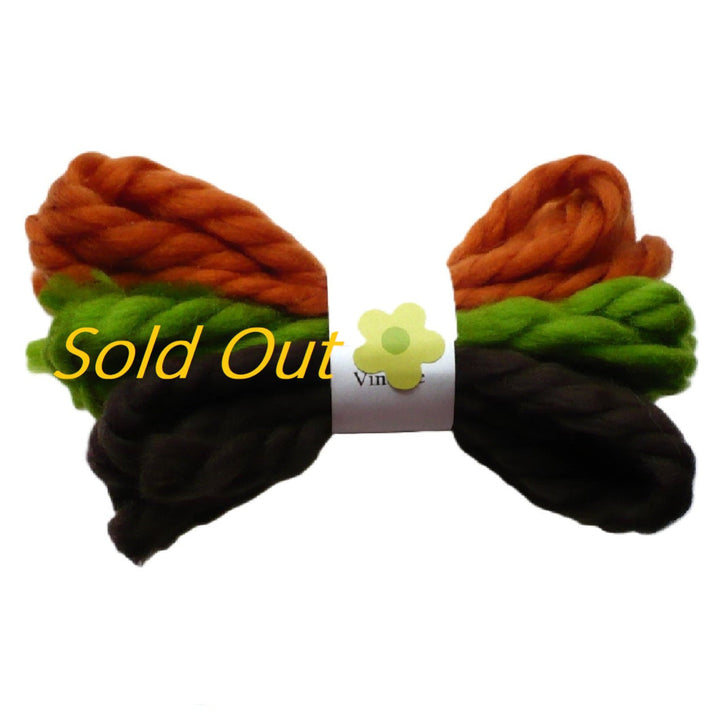 A collection of vintage yarn hair ties in Thanksgiving colors: Rust, olive green, dark brown. Graphic says "sold out".