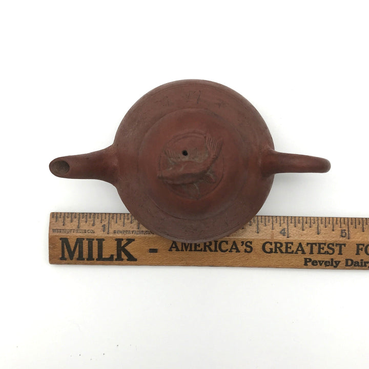 Late Qing Chaozhou Red Clay Teapot  from above by a ruler for scale.