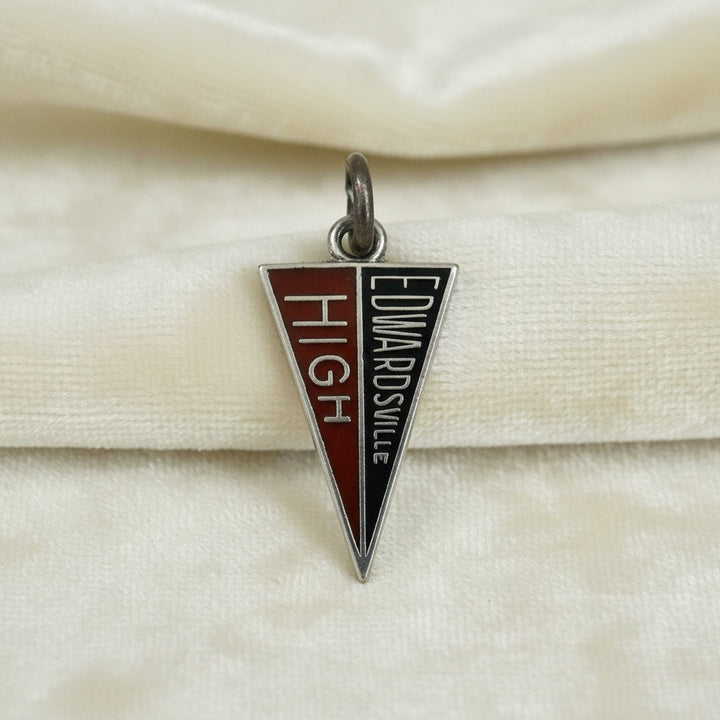1960s Vintage Sterling Edwardsville Illinois High School Pennant Charm on velvet background.