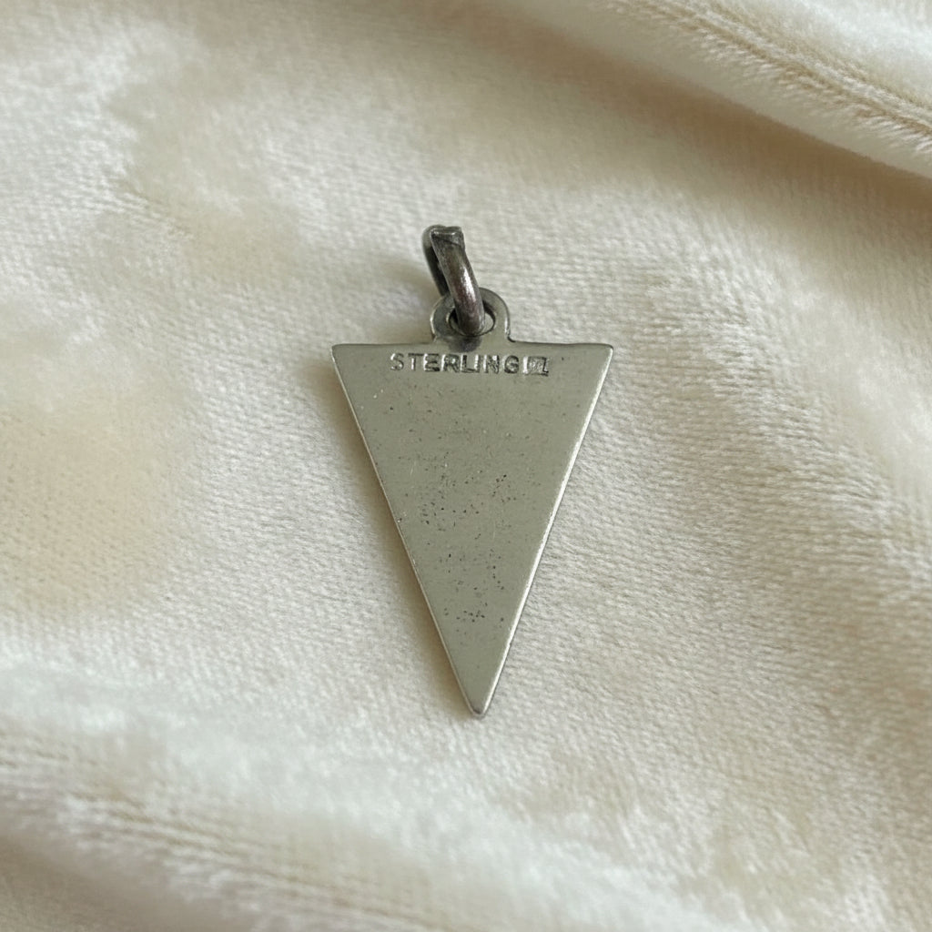 1960s Vintage Sterling Edwardsville Illinois High School Pennant Charm on velvet background. back View shows STERLING hallmark.