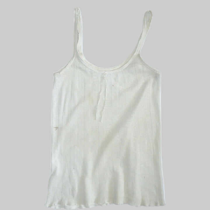 1930s Great Depression Vanta Vestee laying flat on plain background.