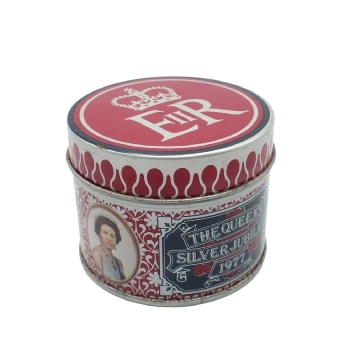 A round metal Matchbox Tin with a red and silver design, featuring 'The Queen's Silver Jubilee 1971' text and a portrait of Queen Elizabeth on the front, set against a plain white background.