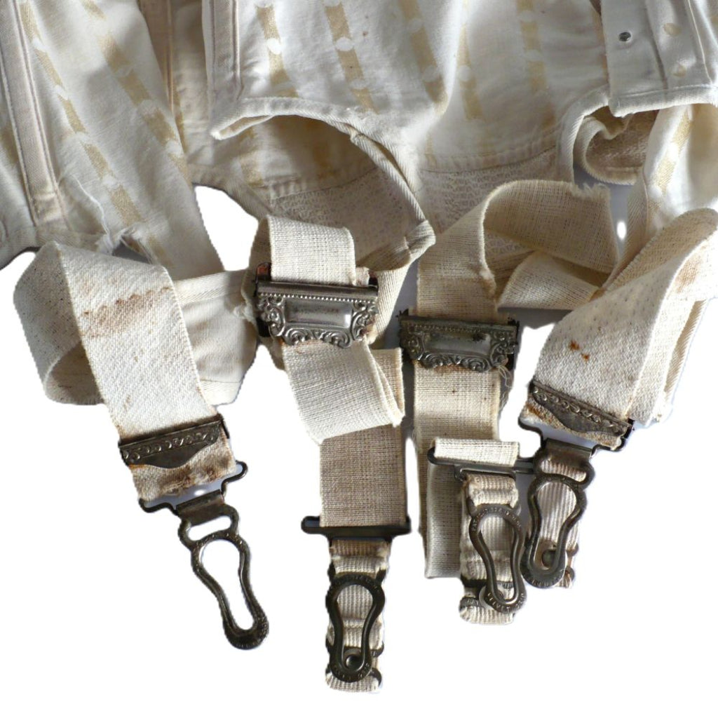 Extremely Rare 1928–1935 Maternity Suspender Belt on mannequin, rear view of clip hardwear.