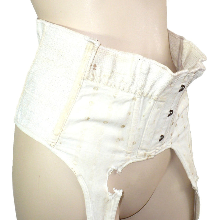 Extremely Rare 1928–1935 Maternity Suspender Belt on mannequin, close up view.