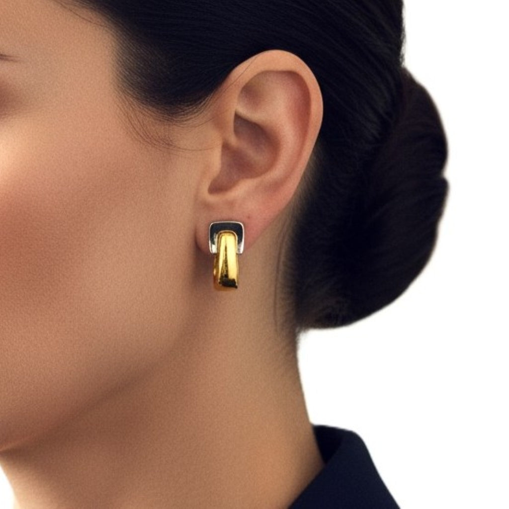 Vintage Givenchy Paris New York Two-tone Metal Clip-on Hoop Earrings on woman.