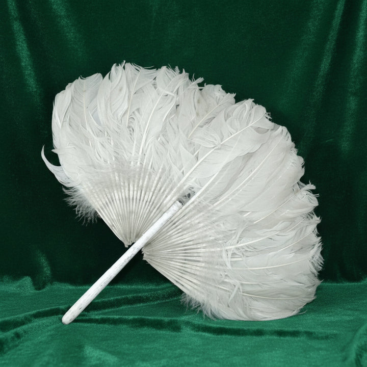 Antique 1910s Zhuge Liang Yu-Shan White Feather Fan Bamboo Stem Handle with green velvet background.