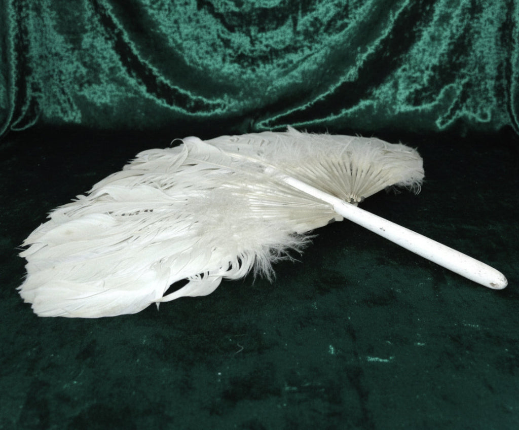 Antique 1910s Zhuge Liang Yu-Shan White Feather Fan Bamboo Stem Handle with green velvet background.
