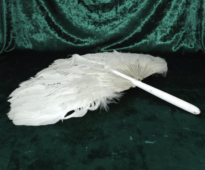 Antique 1910s Zhuge Liang Yu-Shan White Feather Fan Bamboo Stem Handle with green velvet background.