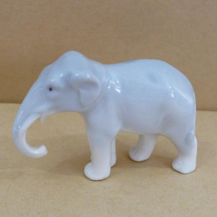 1930s Vintage Small Elephant Figurine by Pfeffer German Porcelain.