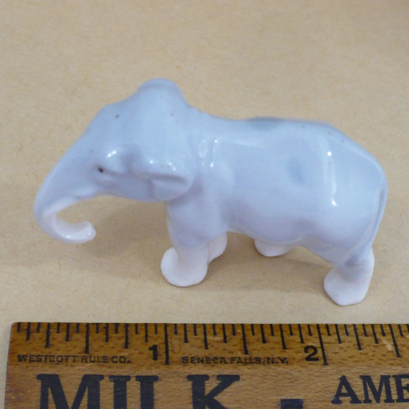 1930s Vintage Small Elephant Figurine by Pfeffer German Porcelain.