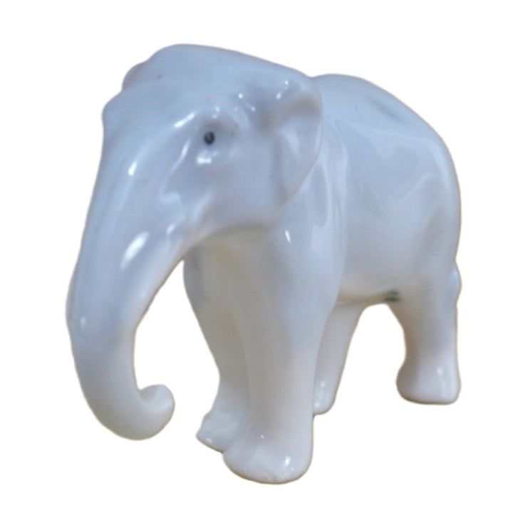 1930s Vintage Small Elephant Figurine by Pfeffer German Porcelain.