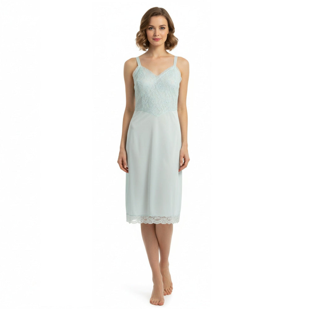 Woman wearing a light 1960s Vintage Mint Green Lace Medium Vintage Full Slip 