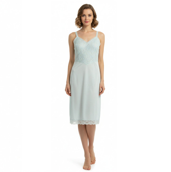 Woman wearing a light 1960s Vintage Mint Green Lace Medium Vintage Full Slip 