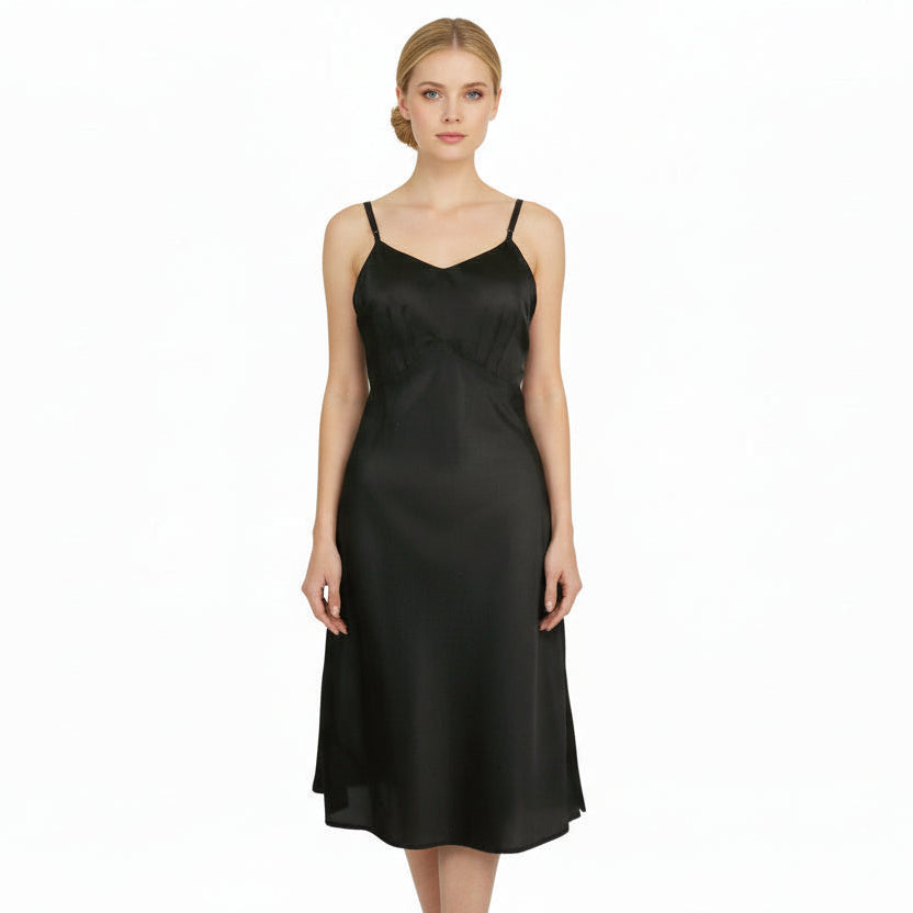 Woman wearing a 1930s Vintage Midnight Black Parachute Silk Nylon Full Slip Size Small on a white background