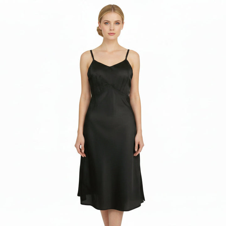Woman wearing a 1930s Vintage Midnight Black Parachute Silk Nylon Full Slip Size Small on a white background