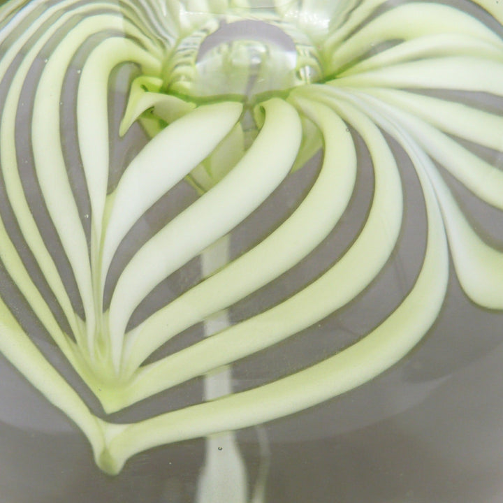 A close-up of a petal on th eflower of 1960s Cristaleria Querandi Paperweight.