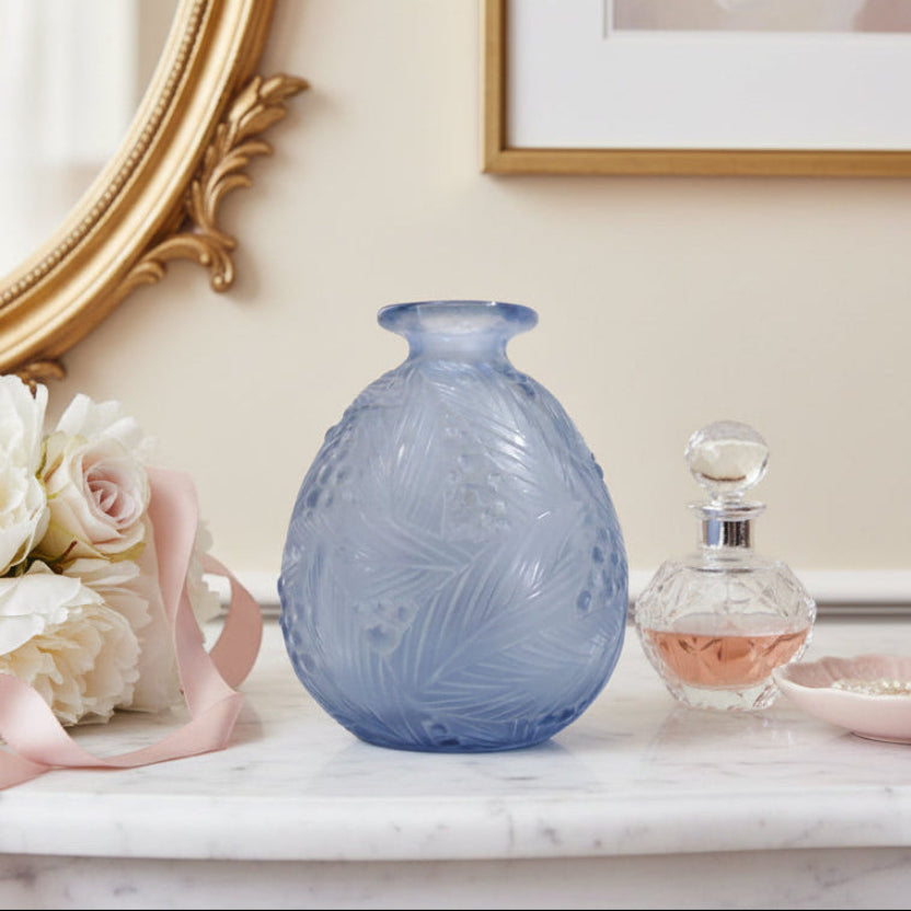 1930s Art Deco Sabino France Blue Glass Vase on a marble surface with flowers and a mirror in the background