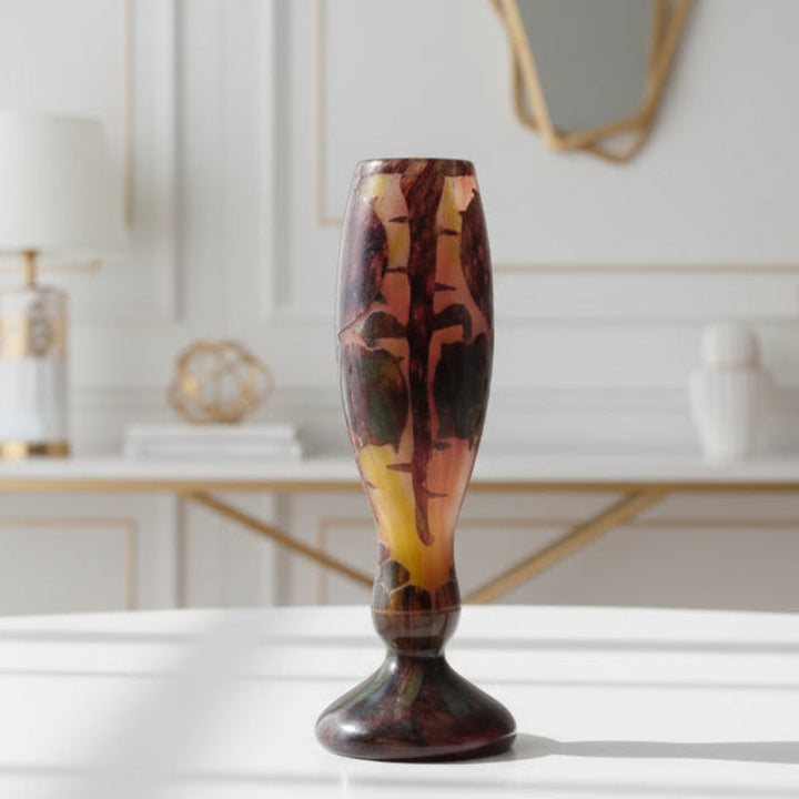 1922-1925 Le Verre Français "Marrons" Table Vase, France Uranium Glass on a white surface in a luxury setting.