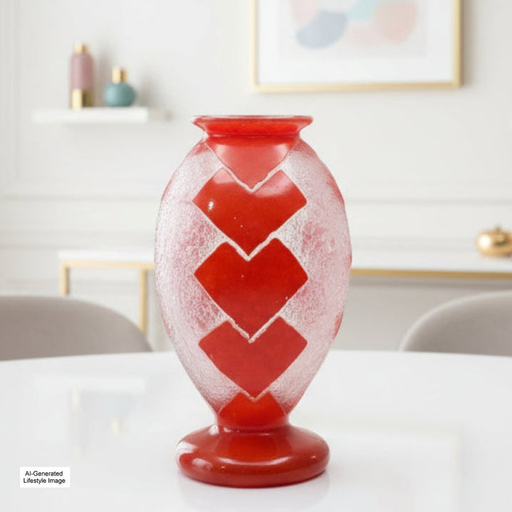 Ai-generated lifestyle image og 1925 Degué Art Deco Orange-Red Cameo Glass Table Vase Geometric Dream on a white surface with a blurred background, view one.