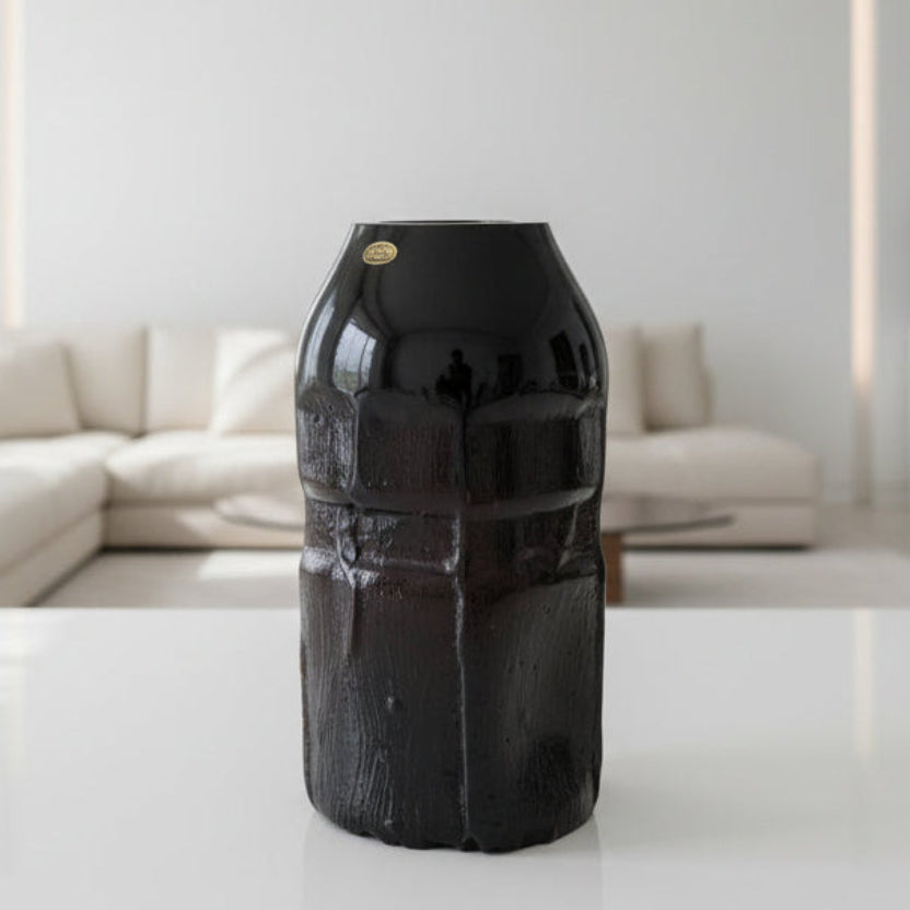 1975 Churba for Querandí Argentina Tree Trunk Glass Vase on a white surface with a blurred indoor setting.