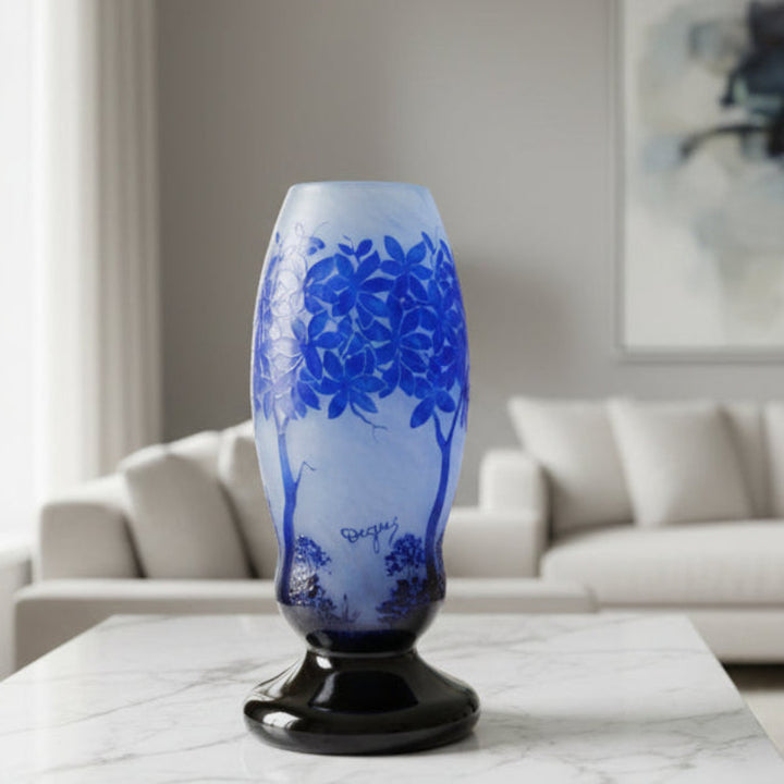 Large Degué French Art Deco Blue Cameo Glass Vase, Signed, on a marble table in a living room setting.