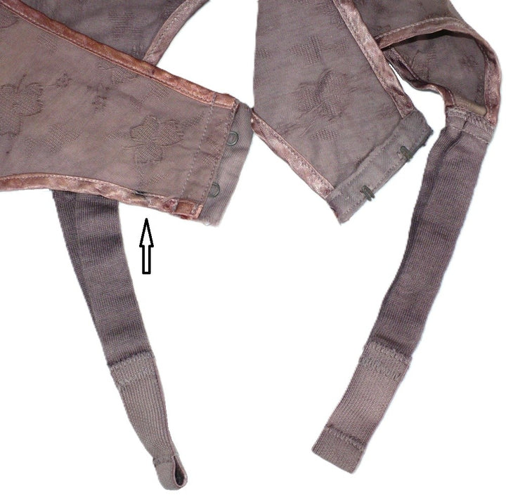 1940s Vintage Wartime Wonder Garter Belt XS, Embroidered Clovers, arrow pointing to tiny stain.