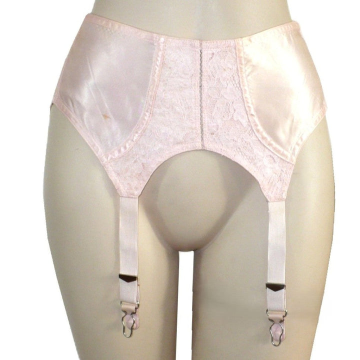 1940s Vintage Pin-up Girl Pink Satin and Lace Garter Belt on a mannequin against a white background.